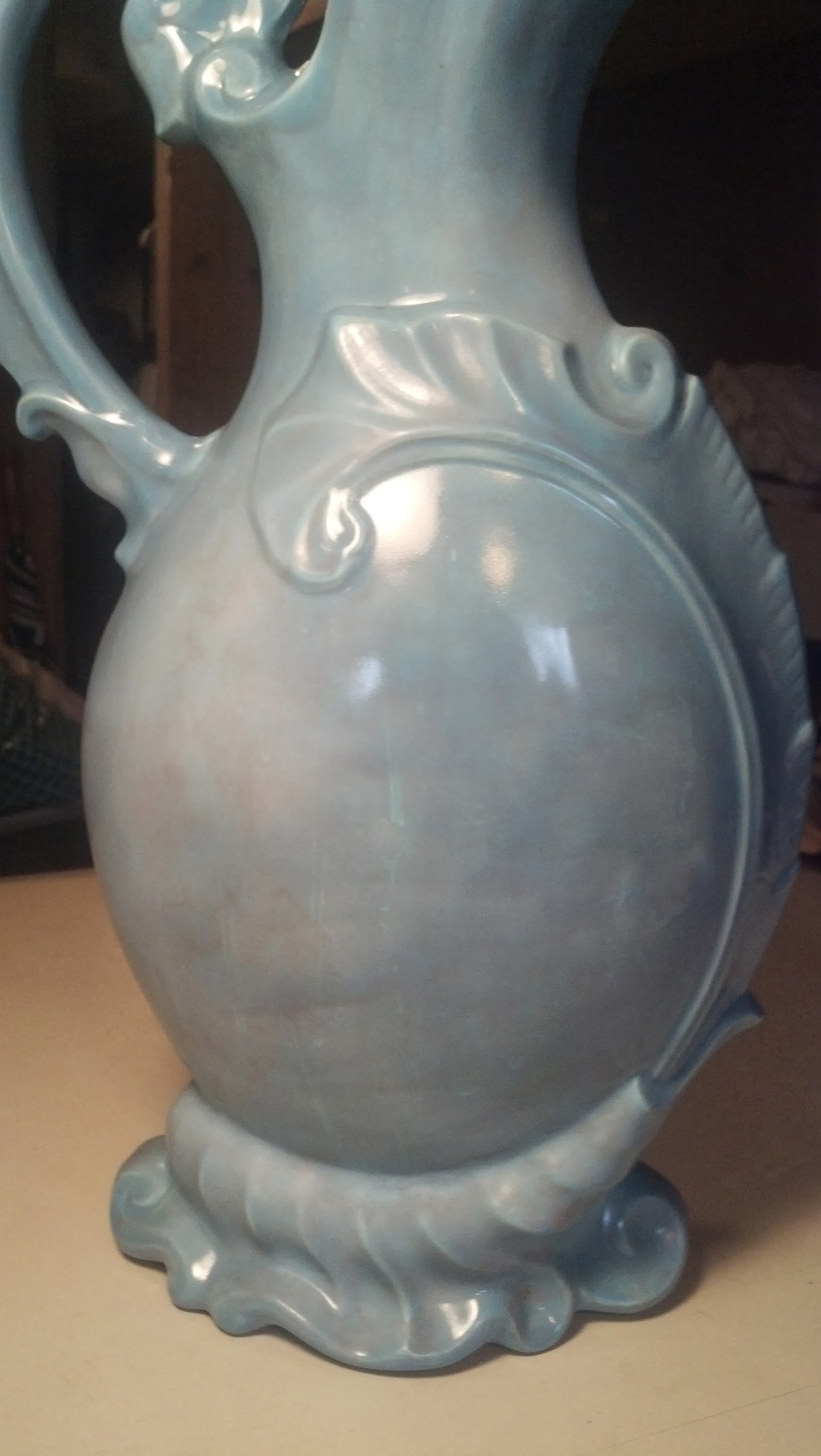 Milk pitcher showing that the finish has been restored.