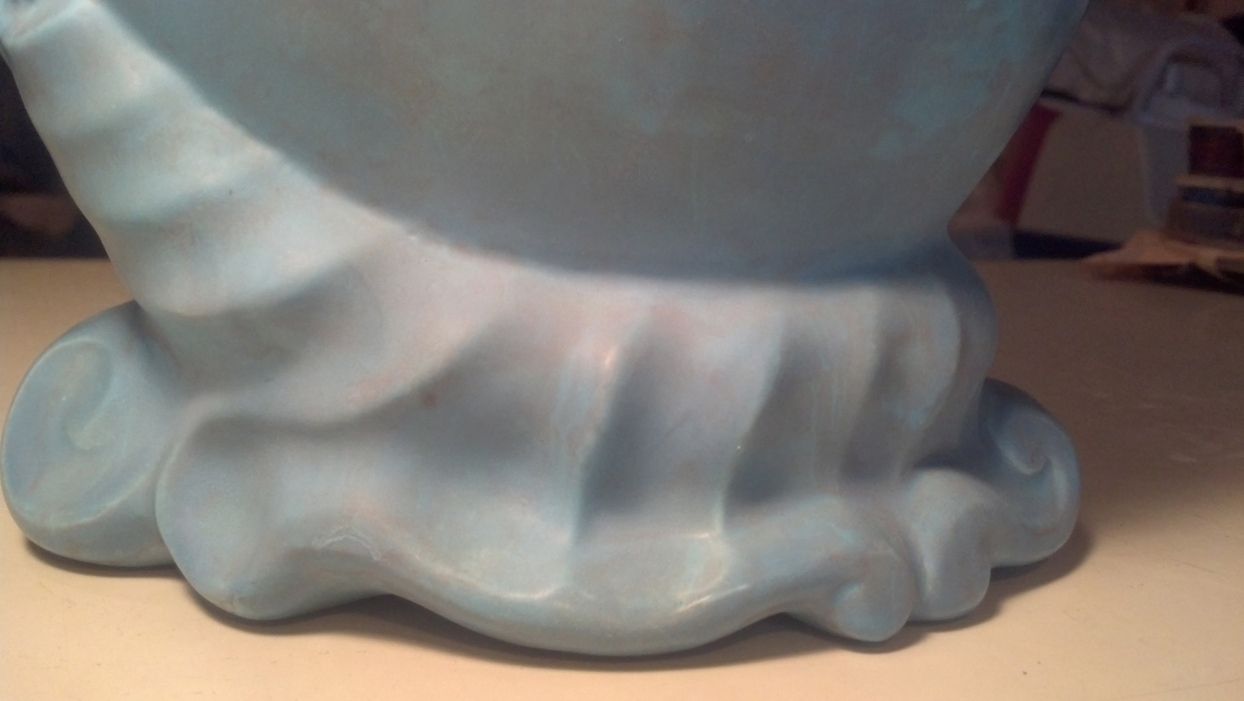 Milk pitcher showing that the finish has been restored.